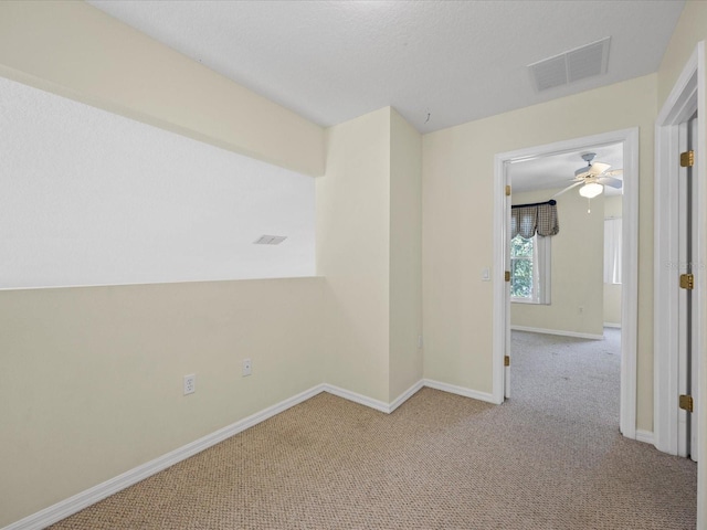 1111 Liberty Hall Dr, Kissimmee, FL 34746 - unfurnished room with carpet flooring and ceiling fan