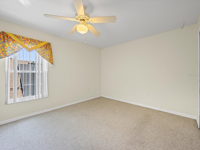 1111 Liberty Hall Dr, Kissimmee, FL 34746 - carpeted empty room with baseboards and a ceiling fan