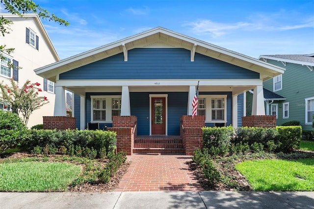 4310 Ethan Ln, Orlando, FL 32814 - view of front of property featuring a porch and brick siding