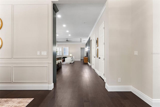 4310 Ethan Ln, Orlando, FL 32814 - corridor with dark wood-style floors and recessed lighting