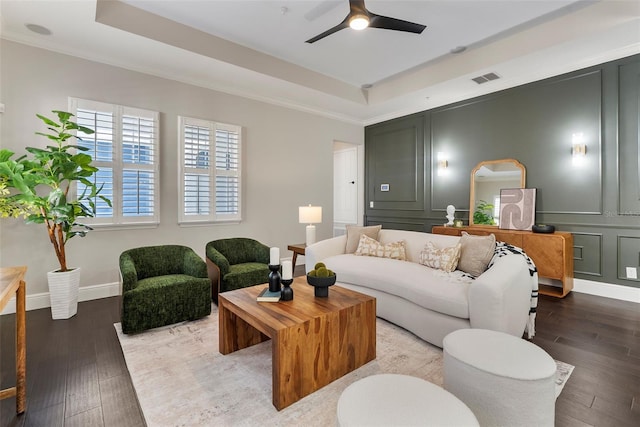 4310 Ethan Ln, Orlando, FL 32814 - living area featuring a tray ceiling, a ceiling fan, hardwood / wood-style flooring, and crown molding