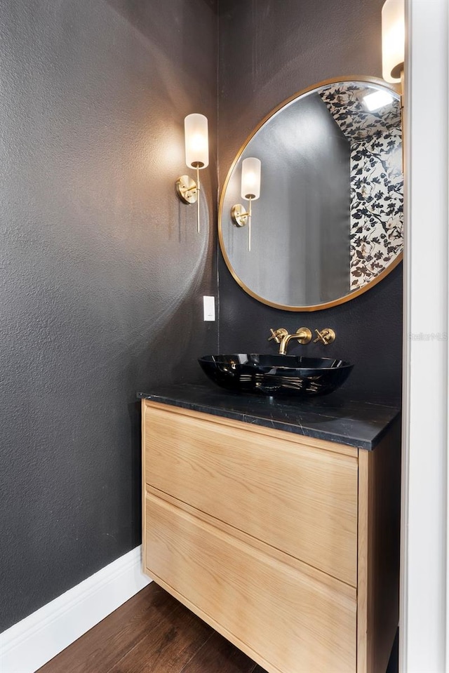 4310 Ethan Ln, Orlando, FL 32814 - bathroom with wood finished floors and vanity