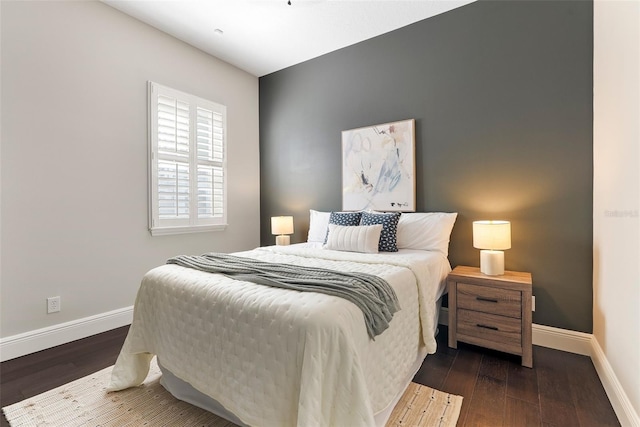 4310 Ethan Ln, Orlando, FL 32814 - bedroom with hardwood / wood-style floors and baseboards