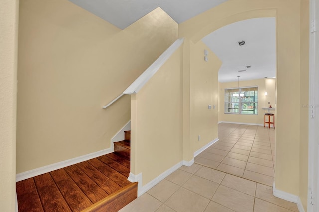 1534 Barking Deer Cv, Casselberry, FL 32707 - stairs featuring tile patterned floors and arched walkways
