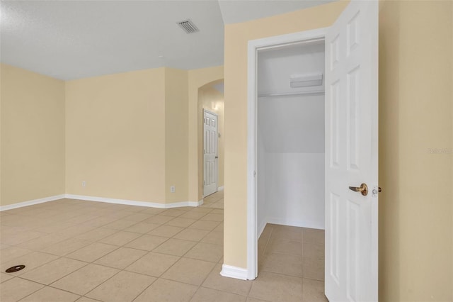 1534 Barking Deer Cv, Casselberry, FL 32707 - unfurnished room featuring light tile patterned floors and arched walkways