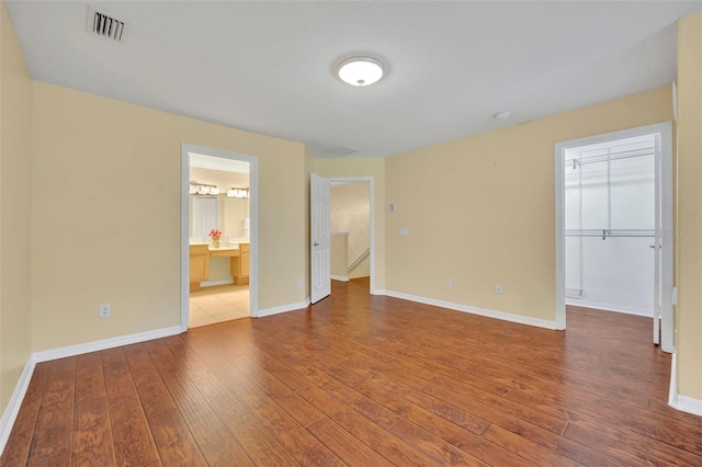 1534 Barking Deer Cv, Casselberry, FL 32707 - spare room featuring wood-type flooring and baseboards