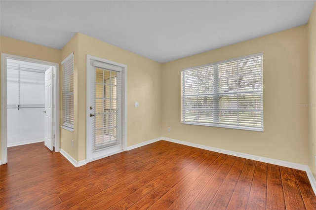 1534 Barking Deer Cv, Casselberry, FL 32707 - empty room featuring baseboards and hardwood / wood-style floors