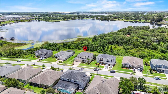 16412 Good Hearth Blvd, Clermont, FL 34711 - aerial perspective of suburban area featuring a nearby body of water