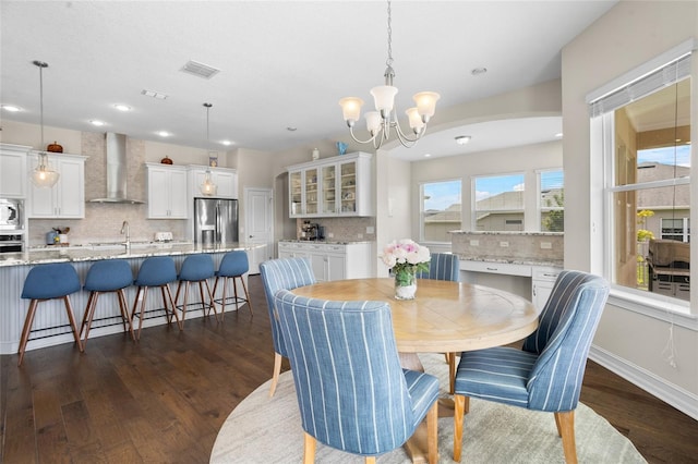 16412 Good Hearth Blvd, Clermont, FL 34711 - dining room featuring dark wood-style floors, a chandelier, and recessed lighting