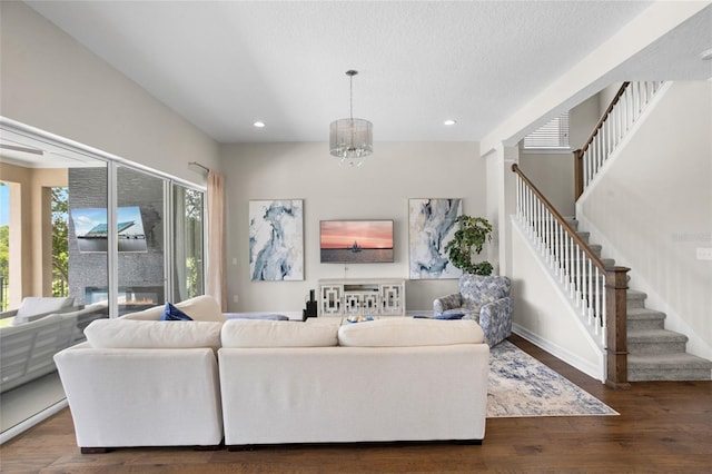 16412 Good Hearth Blvd, Clermont, FL 34711 - living room with stairway, recessed lighting, a chandelier, and wood finished floors