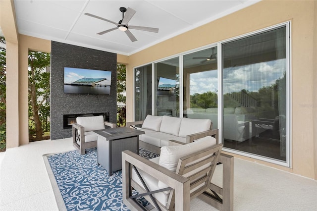 16412 Good Hearth Blvd, Clermont, FL 34711 - view of patio featuring ceiling fan and an outdoor living space with a fireplace