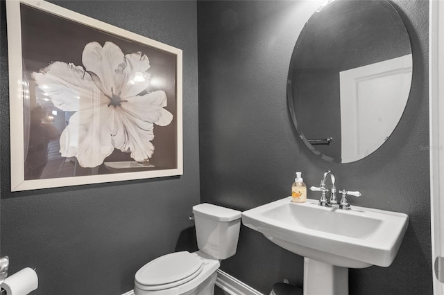 16412 Good Hearth Blvd, Clermont, FL 34711 - half bathroom featuring toilet and a sink