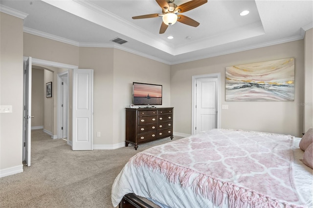 16412 Good Hearth Blvd, Clermont, FL 34711 - bedroom with light carpet, crown molding, recessed lighting, a tray ceiling, and a ceiling fan