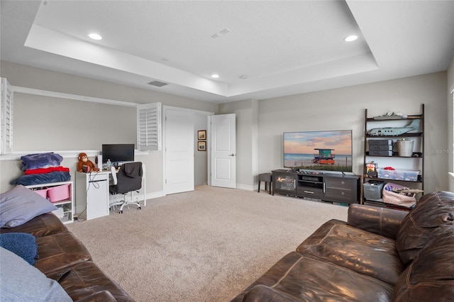 16412 Good Hearth Blvd, Clermont, FL 34711 - living area with a tray ceiling, carpet floors, recessed lighting, and an office area