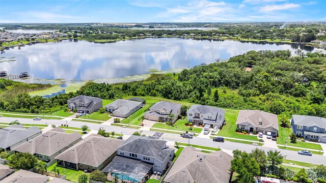 16412 Good Hearth Blvd, Clermont, FL 34711 - aerial perspective of suburban area featuring a nearby body of water