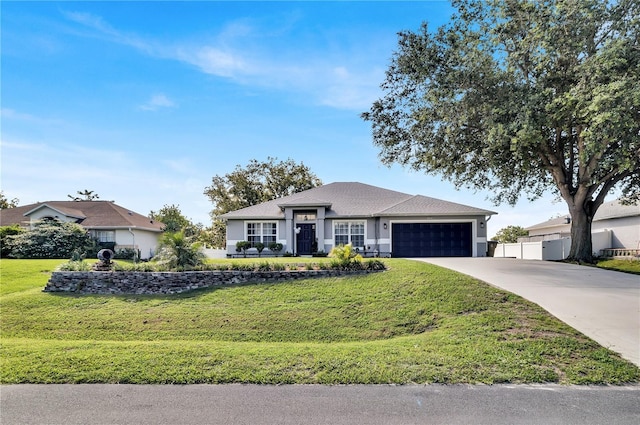 2919 Foraker Way, Kissimmee, FL 34758 - view of front of property with an attached garage and concrete driveway
