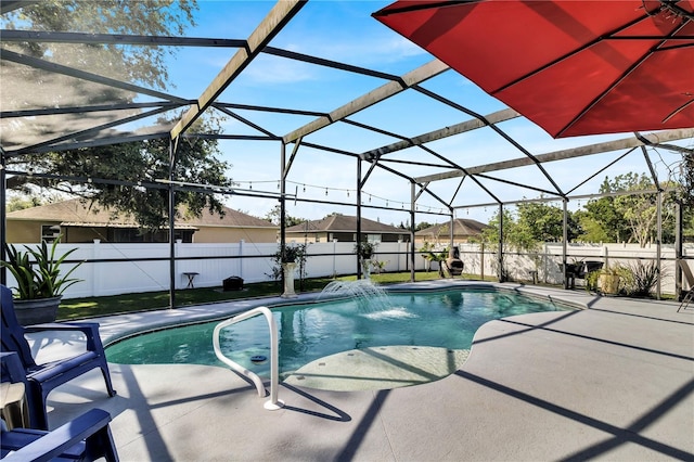 2919 Foraker Way, Kissimmee, FL 34758 - view of swimming pool featuring a fenced backyard, a patio, and a lanai