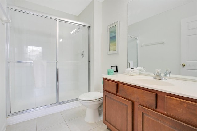 2669 Manesty Ln, Kissimmee, FL 34747 - bathroom with tile patterned floors, vanity, and a stall shower