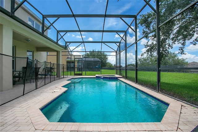 2669 Manesty Ln, Kissimmee, FL 34747 - view of pool with a patio, a pool with connected hot tub, and a lanai