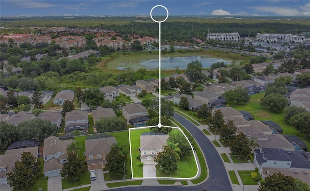 2669 Manesty Ln, Kissimmee, FL 34747 - aerial perspective of suburban area featuring a nearby body of water and property boundaries highlighted