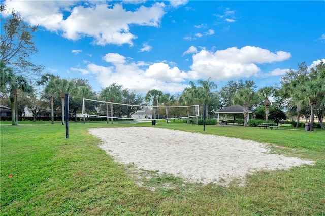 2669 Manesty Ln, Kissimmee, FL 34747 - surrounding community with a gazebo, volleyball court, and a yard