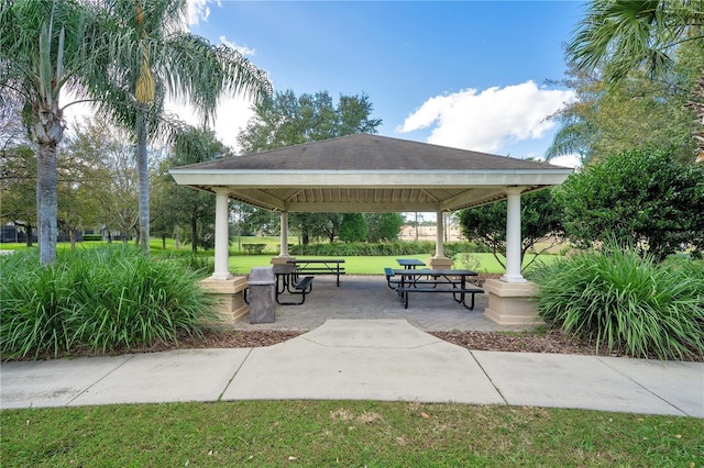 2669 Manesty Ln, Kissimmee, FL 34747 - view of property's community featuring a gazebo and a lawn