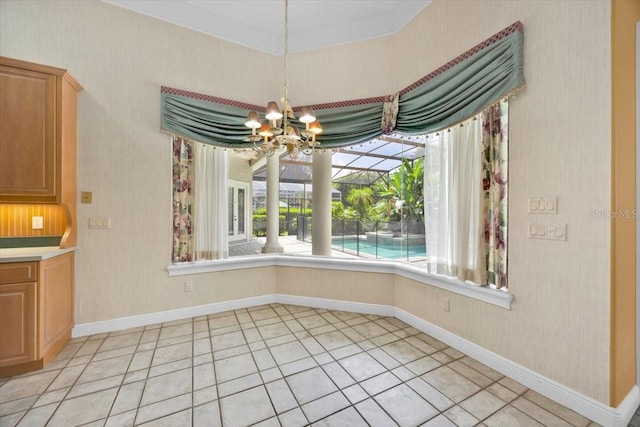 307 Running Wind Ln, Maitland, FL 32751 - unfurnished dining area featuring wallpapered walls, a chandelier, and light tile patterned floors