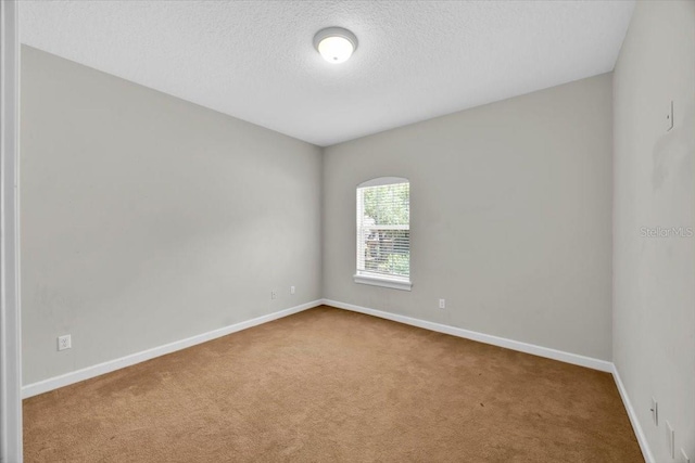 307 Running Wind Ln, Maitland, FL 32751 - unfurnished room with carpet floors and a textured ceiling
