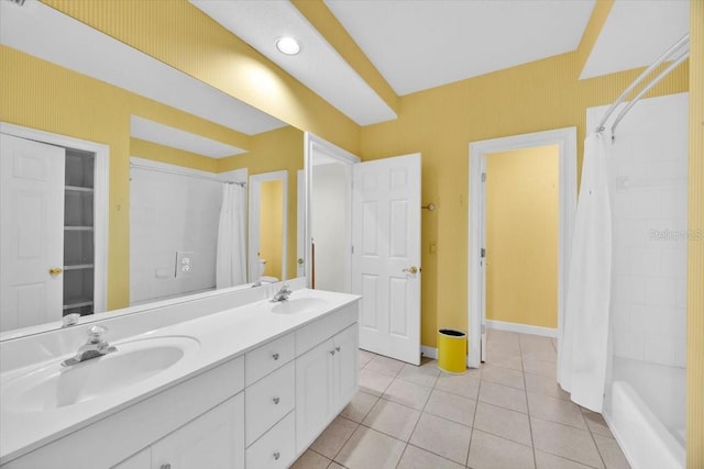 307 Running Wind Ln, Maitland, FL 32751 - full bathroom with double vanity, tile patterned flooring, and shower / tub combo with curtain