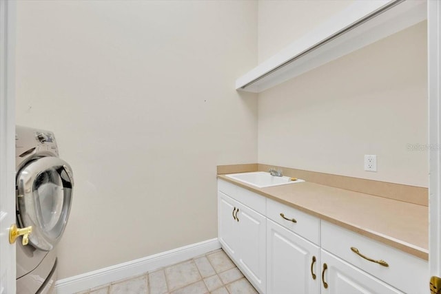 307 Running Wind Ln, Maitland, FL 32751 - laundry area featuring washer / dryer and cabinet space
