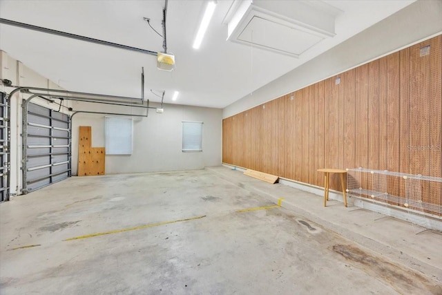307 Running Wind Ln, Maitland, FL 32751 - garage with a garage door opener and wood walls