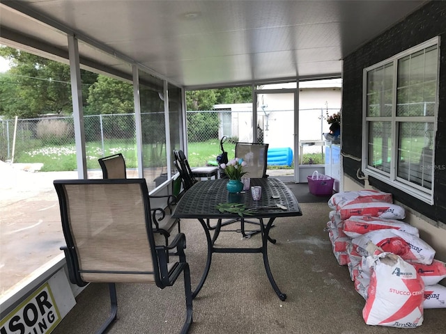10 S Semoran Blvd S, Orlando, FL 32822 - sunroom featuring outdoor dining space