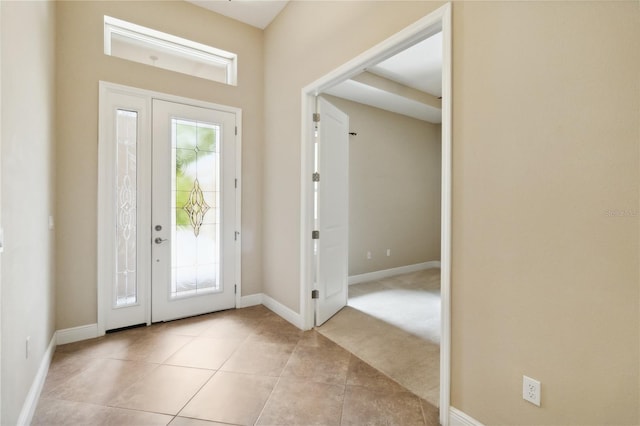 207 Spalding Way, Deland, FL 32724 - entryway with baseboards and light tile patterned floors