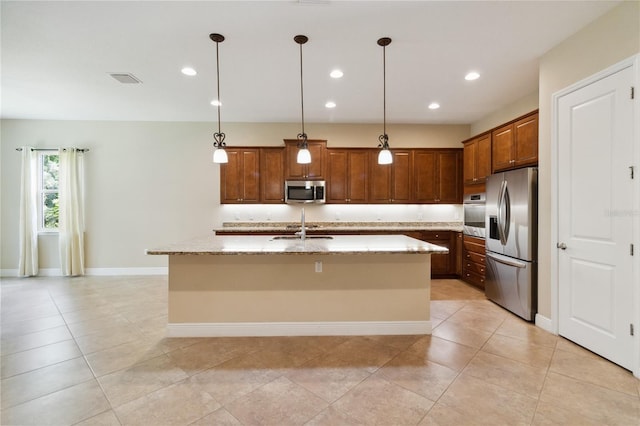207 Spalding Way, Deland, FL 32724 - kitchen featuring stainless steel appliances, light stone countertops, a kitchen island with sink, recessed lighting, and pendant lighting