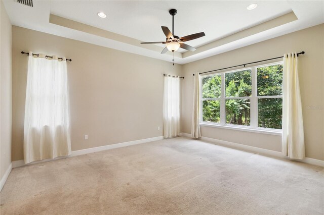 207 Spalding Way, Deland, FL 32724 - carpeted empty room featuring a tray ceiling, recessed lighting, and ceiling fan