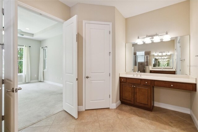 207 Spalding Way, Deland, FL 32724 - full bathroom featuring vanity, tile patterned floors, and an enclosed shower