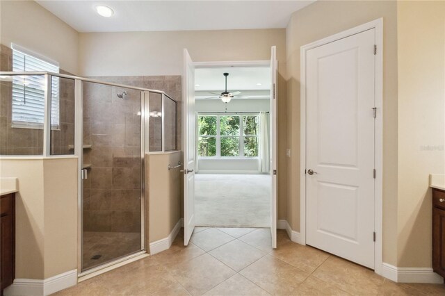 207 Spalding Way, Deland, FL 32724 - bathroom featuring vanity, a shower stall, a ceiling fan, tile patterned flooring, and recessed lighting