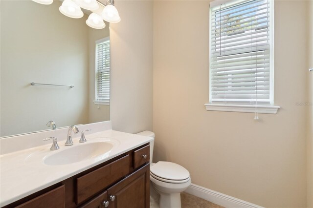 207 Spalding Way, Deland, FL 32724 - bathroom featuring vanity and healthy amount of natural light