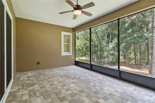 207 Spalding Way, Deland, FL 32724 - unfurnished sunroom featuring a ceiling fan