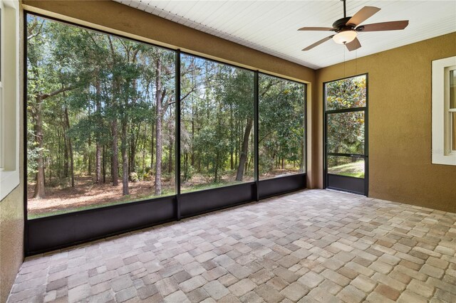 207 Spalding Way, Deland, FL 32724 - unfurnished sunroom with a ceiling fan