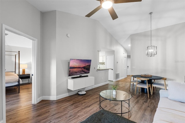 7742 Sugar Bend Dr Unit 7742, Orlando, FL 32819 - living area featuring a ceiling fan, wood finished floors, a chandelier, and lofted ceiling