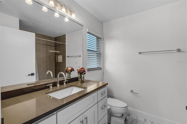 7742 Sugar Bend Dr Unit 7742, Orlando, FL 32819 - bathroom featuring marble finish flooring, vanity, and a shower
