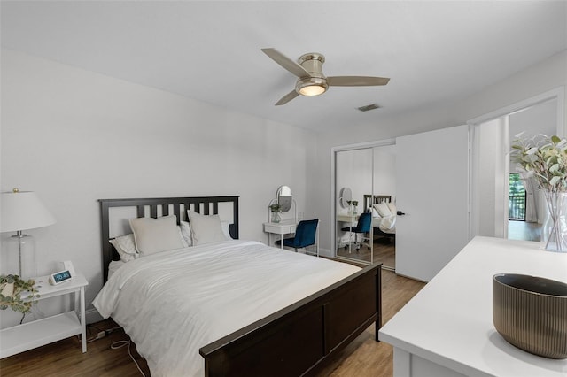 7742 Sugar Bend Dr Unit 7742, Orlando, FL 32819 - bedroom with light wood-style flooring, a closet, and ceiling fan