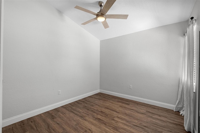 7742 Sugar Bend Dr Unit 7742, Orlando, FL 32819 - spare room with lofted ceiling, dark wood-style flooring, and ceiling fan