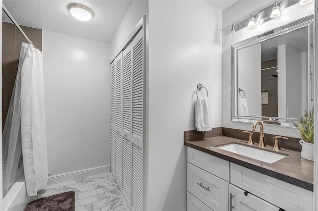 7742 Sugar Bend Dr Unit 7742, Orlando, FL 32819 - bathroom featuring marble finish flooring, vanity, a closet, and shower / bath combo with shower curtain