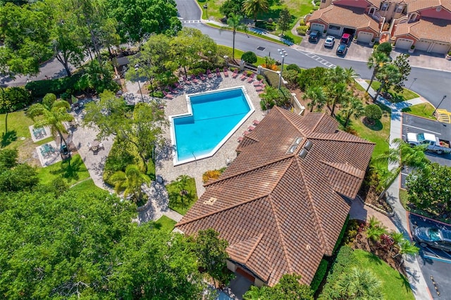 7742 Sugar Bend Dr Unit 7742, Orlando, FL 32819 - drone / aerial view of a pool