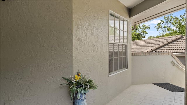 165 Durham Pl Unit 165, Longwood, FL 32779 - property entrance with stucco siding and a tile roof