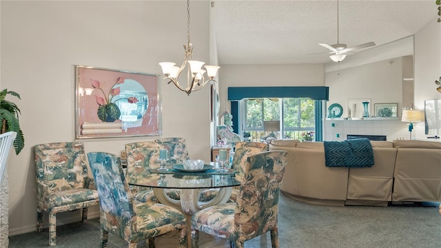 165 Durham Pl Unit 165, Longwood, FL 32779 - carpeted dining space featuring a chandelier, ceiling fan, a textured ceiling, and lofted ceiling