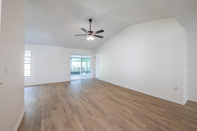 4800 Reginald Rd, Orlando, FL 32829 - unfurnished room with a ceiling fan, lofted ceiling, and light wood-type flooring