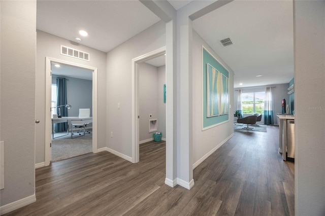 1902 Walnut Creek Dr, Kissimmee, FL 34744 - hall with dark wood finished floors, a desk, and recessed lighting
